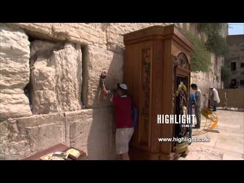 JJ_019 Highlight Films Israel footage store: Jewish prayers in The Western Wall tilt down