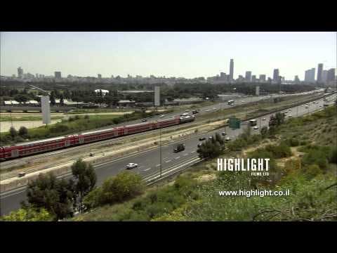T 033 Israel Footage library: Tel Aviv footage - cars & train on Ayalon highway & Tel Aviv skyline