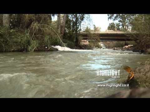 LN 022 Israel stock footage library: Jordan River, with a strong winter stream - low angle