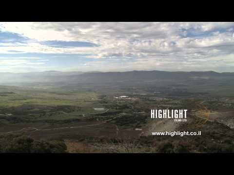 LN 077 Israel stock footage library: Pan right over Lower Galilee mountains landscape at summer