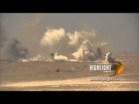 MI020 Israel Stock Footage Store: IDF military training - shells and missiles exploding in desert