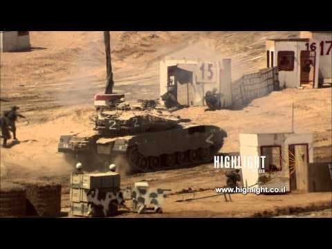 MI015 Israel Military Stock Footage Store: IDF tanks and soldiers take over a mock military target