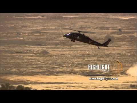 MI009 Israel Military Stock Footage Store: IDF military heclicopter circles and lands