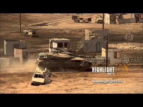 MI014 Israel Military Stock Footage Store: IDF tank crossing a moke battle field in the Negev Desert