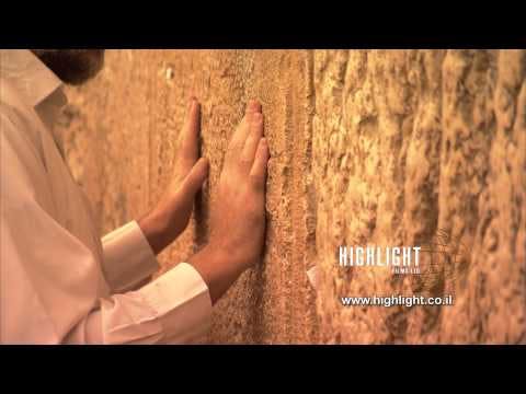 JJ_036 Highlight Films Israel footage store: C/U hands of a Jewish worshiper in The Western Wall